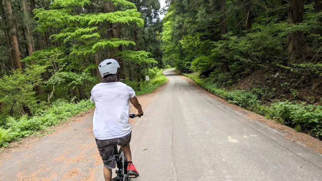 Cycle tour through the lush green nature of the countryside of Japan, in Yuzawa and Minamiuonuma